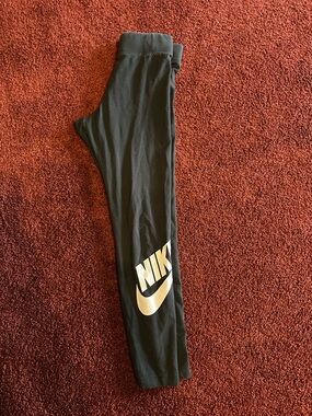 Nike Girls Black Leggings with Shiny Gold Swoosh